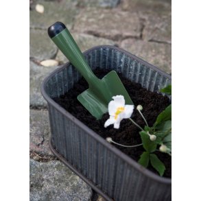 Grn skovl til udplantning af blomster i haven
